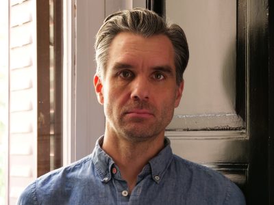 Portrait photo of video & projection designer Will Duke